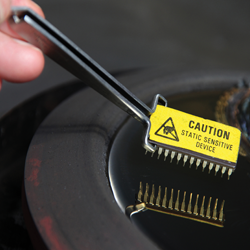 Ion soft landing distributes negative POM ions (bright spots) evenly onto a supercapacitor, leaving unwanted positive ions behind.