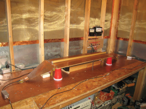 A vial that contains liquid-metal particles suspended in ethanol. The particles were used to demonstrate heat-free soldering.