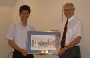 Brian Lawrence presents a 2009 Achievement award to Mr. Ihara